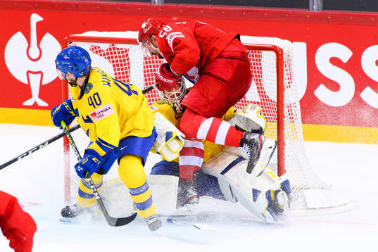 Anton Slepyshev of Russia  collides with goalkeeper Adam