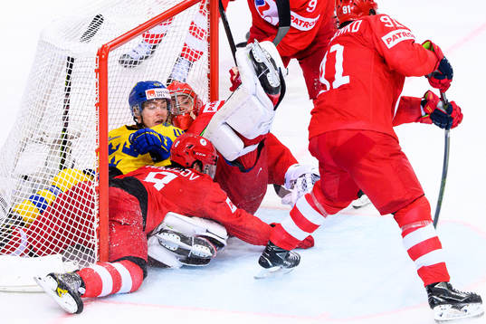 Andreas Wingerli of Sweden collides with goalkeeper
