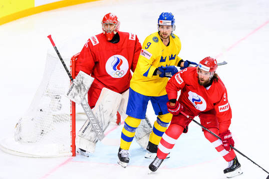 Adrian Kempe of Sweden against goalkeeper Alexander Samonov
