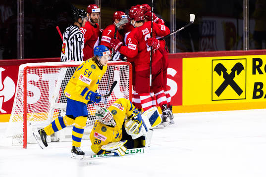 Goalkeeper Adam Reideborn and Jonathan Pudas of Sweden look