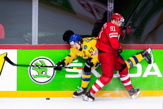 Rickard Rakell of Sweden and Vladimir Tarasenko of Russia