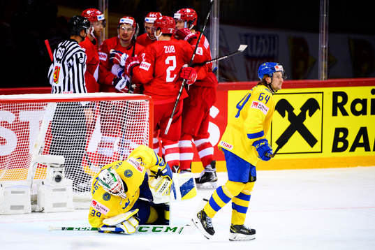 Goalkeeper Adam Reideborn and Jonathan Pudas of Sweden look