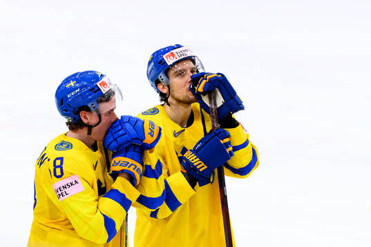 Victor Olofsson and Henrik Tömmernes of Sweden looks