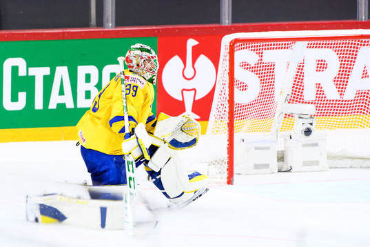 Goalkeeper Adam Reideborn of Sweden looks dejected