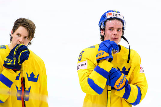 Filip Hållander and Victor Olofsson of Sweden look dejected