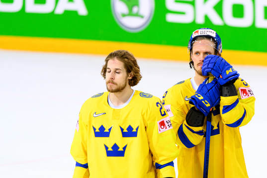 Mario Kempe and Magnus Nygren of Sweden looks dejected