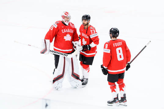 Goalkeeper Darcy kuemper , Brandon Pirri and Liam Foudy of