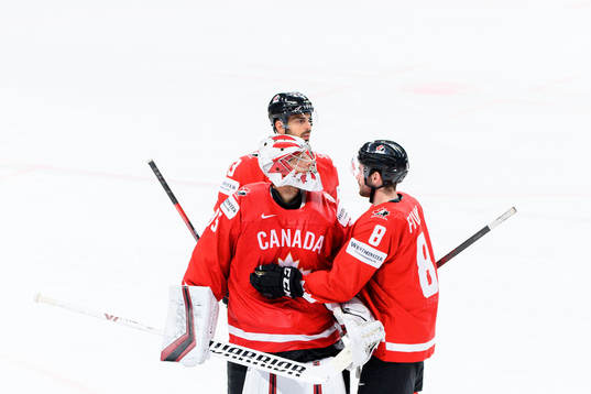 Goalkeeper Darcy kuemper , Brandon Pirri and Liam Foudy of