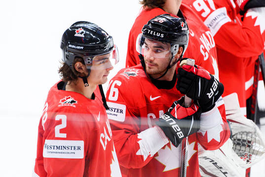 Sean Walker of Canada looks dejected