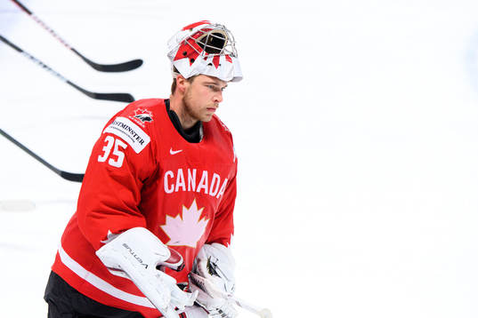 Goalkeeper Darcy kuemper of Canada looks dejected