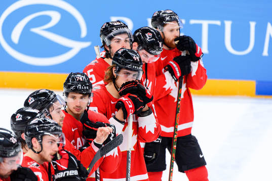 Maxime Comtois of Canada looks dejected