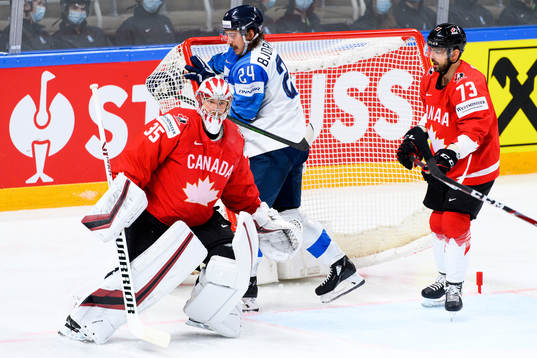 Goalkeeper Darcy kuemper and Brandon Pirri of Canada