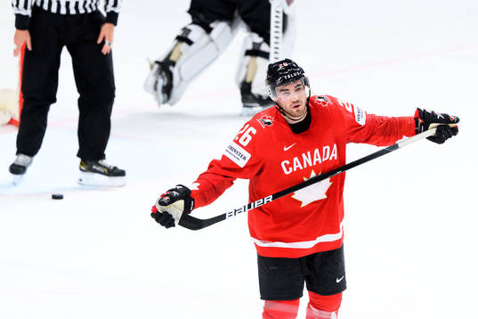 Sean Walker of Canada looks dejected