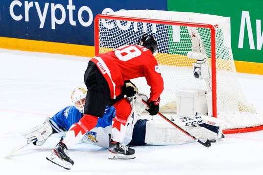 Goalkeeper Jussi Olkinuora of Finland denies a shootout