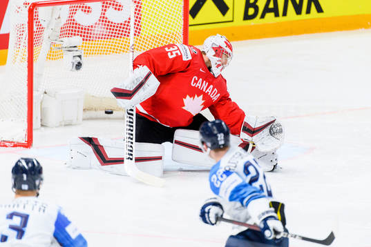 Arttu Ruotsalainen of Finland scores the 1-1 goal behind