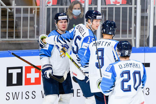 Arttu Ruotsalainen and Anton Lundell of Finland celebrate