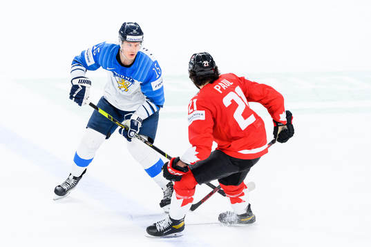 Anton Lundell of Finland and Nick Paul of Canada