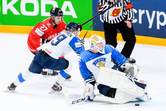 Goalkeeper Jussi Olkinuora of Finland with a save