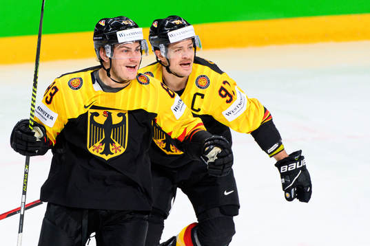 Moritz Muller and Leonhard Pfoderl of Germany celebrate the