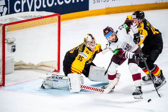 Goalkeeper Mathias Niederberger and Jonas Muller and