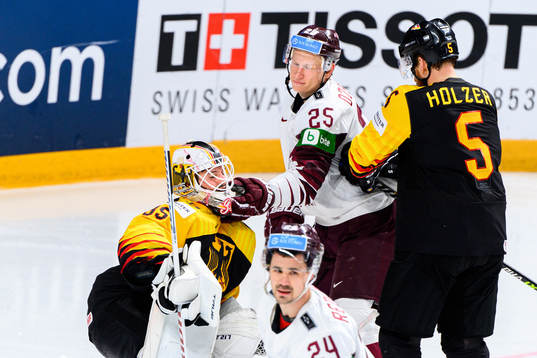 Goalkeeper Mathias Niederberger and Korbinian Holzer of