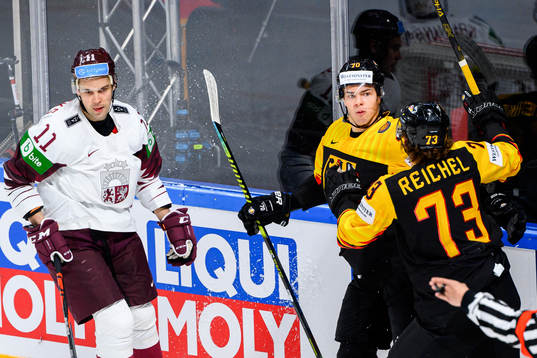 Kristaps Sotnieks of Latvia looks dejected as John Peterka