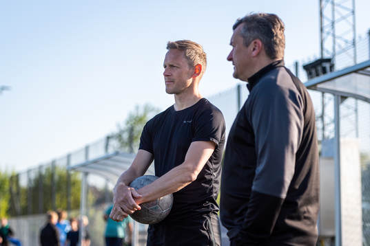 Magnus Andersson och huvudtränare Eimantas Poderis