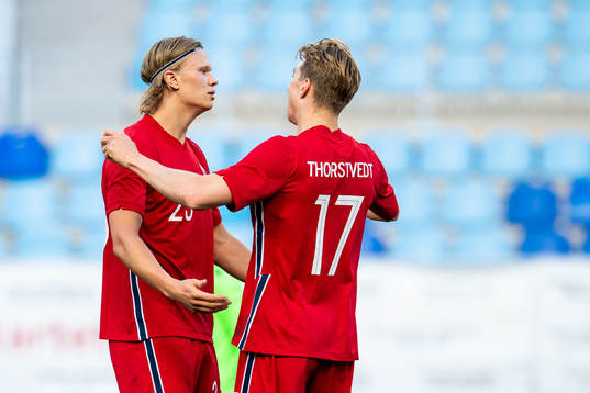 Erling Braut Haaland of Norway celebrates with teammate