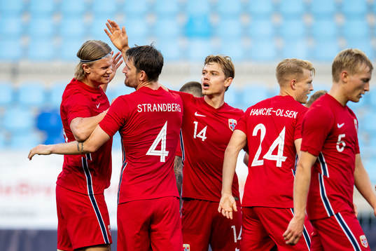 Erling Braut Haaland of Norway celebrates with teammates