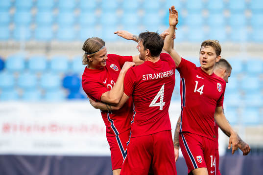 Erling Braut Haaland of Norway celebrates with teammates