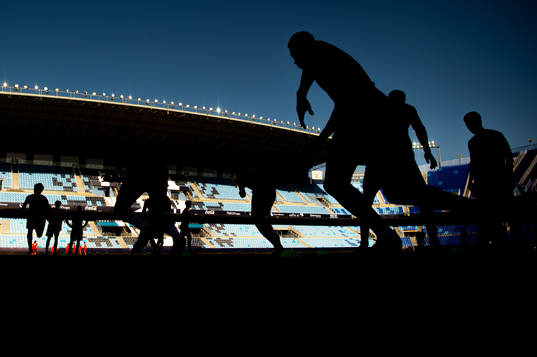 The silhouette of Erling Braut Haaland warming up