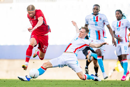 Erling Braut Haaland of Norway and Enes Mahmutovic of