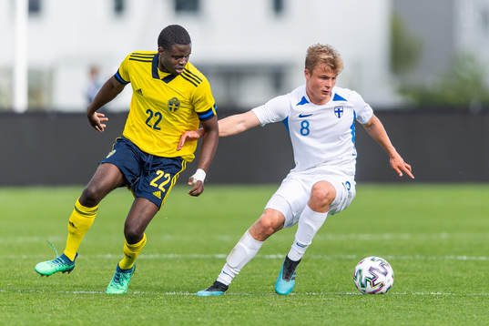 Benjamin Mbunga Kimpioka of Sweden and Jaakko Oksanen of