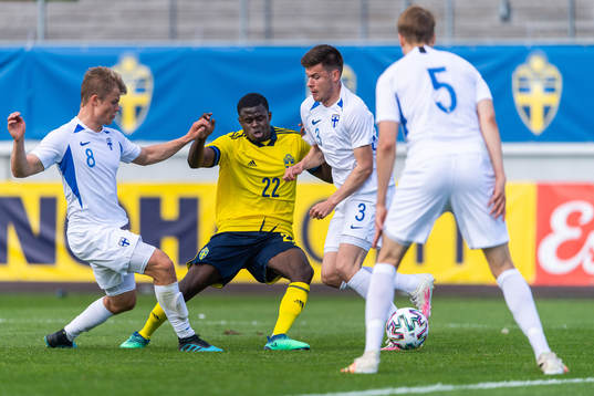 Benjamin Mbunga Kimpioka of Sweden competes for the ball