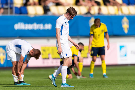 Juho Ojanen of Finland looks dejected