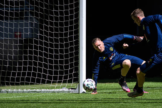 goalkeeper Robin Olsen and Emil Krafth of the Swedish