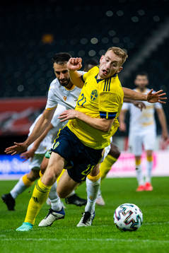 Andre Jack Calisir of Armenia and Dejan Kulusevski of Sweden