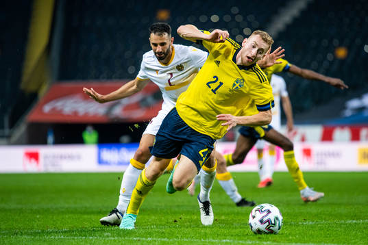 Andre Jack Calisir of Armenia and Dejan Kulusevski of Sweden