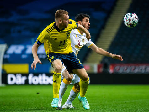 Dejan Kulusevski of Sweden and Karen Muradyan of Armenia