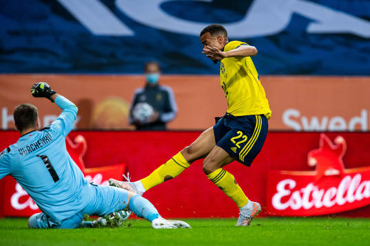 Goalkeeper Davit Yurchenko of Armenia and Robin Quaison