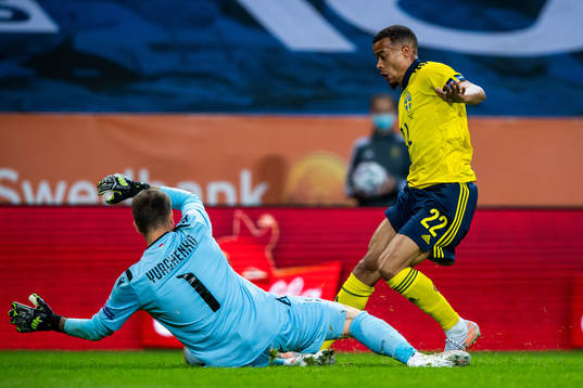 Goalkeeper Davit Yurchenko of Armenia and Robin Quaison