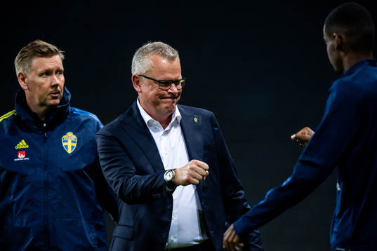 Assistant coach Peter Wettergren , Janne Andersson, head