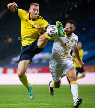 Dejan Kulusevski of Sweden in action against Andre Jack