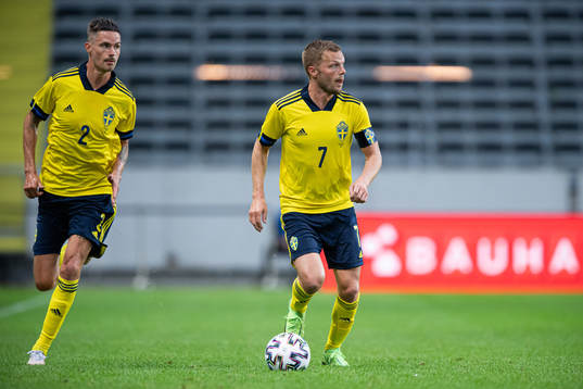 Mikael Lustig and Sebastian Larsson of Sweden