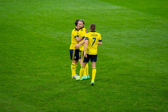 Emil Forsberg of Sweden celebrates with teammates