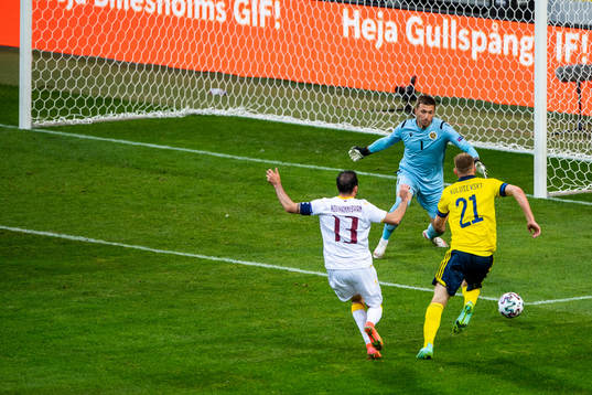 Goalkeeper Davit Yurchenko and Kamo Hovhannisyan of Armenia