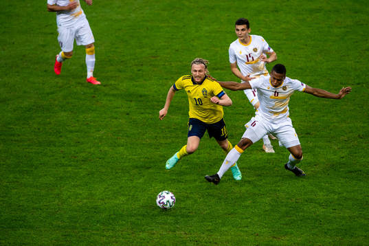 Emil Forsberg of Sweden and Eduard Spertsyan and Wbemyar