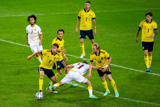 Albin Ekdal  and Emil Forsberg of Sweden and Vahan