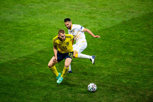 Dejan Kulusevski of Sweden and Andre Jack Calisir of Armenia
