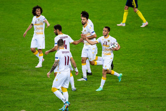 Vahan Bichakhcyan of Armenia celebrates 2-1